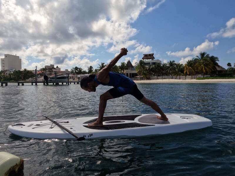 Cancún: Sup Yoga and Meditation over the Caribbean Sea - Meditation on gentle water with a Tibetan bowl