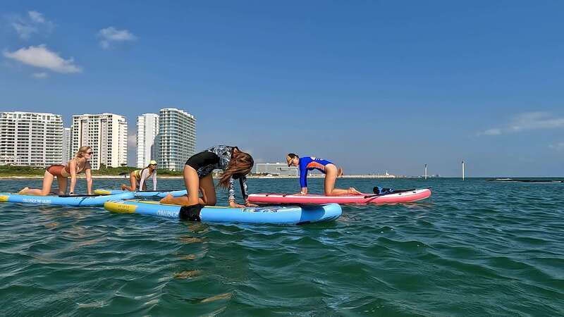 Cancún: Sup Yoga and Meditation over the Caribbean Sea - The 50-minute SUP yoga class: how they help all levels stay steady