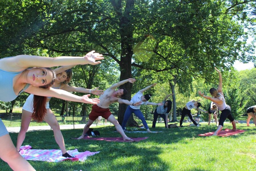 Central Park: Highest Rated Yoga Class in New York City! - Central Park skyline yoga near Sheep Meadow