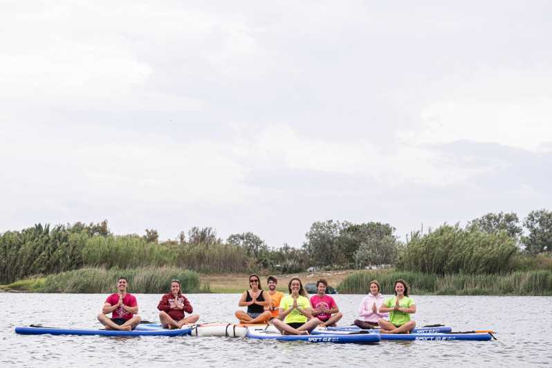 Empuriabrava: SUP Yoga class - Yoga on a Board: What the Instructor Adjusts for Beginners and Regulars