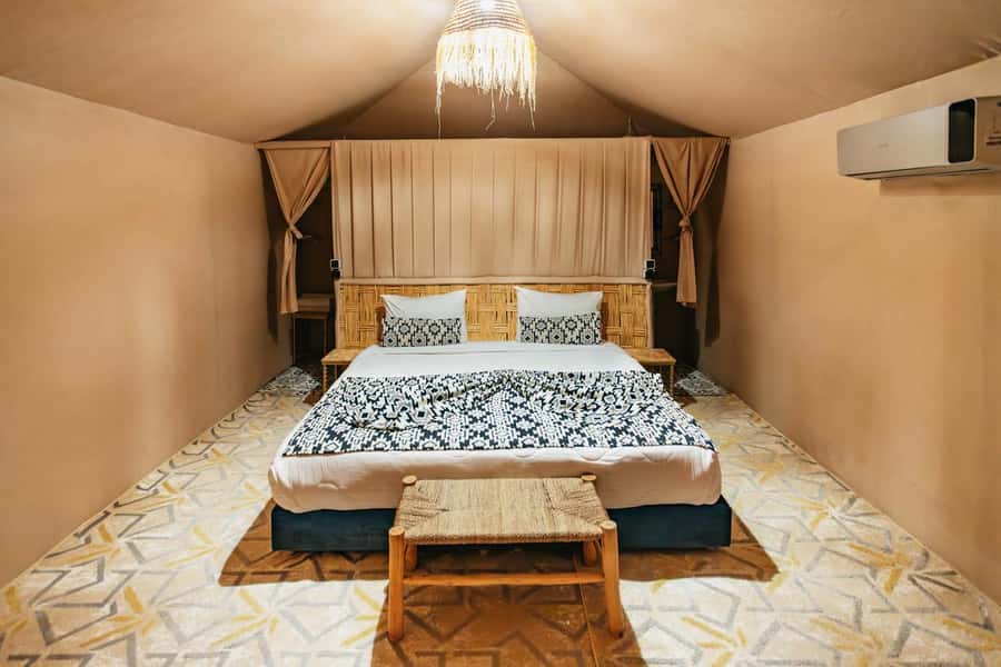 Marrakech: Agafay Desert Retreat, Tent, Dinner, Show & Pool - Welcome tea, pools, and optional quad or camel at the camp