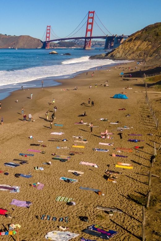 San Francisco: Silent Disco Yoga at Baker Beach - Friday Sunset Groove Yoga: Golden Hour Plus Water-Edge Dancing
