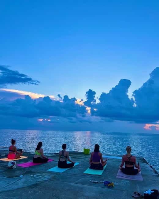 Sliema: Beach Yoga Class - The 75-minute flow: breathing, sun salutations, poses, then release